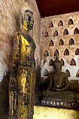 Vientiane, Laos - Wat Si Saket, The gallery around the sim houses thousands of Buddha statues in various mudras, dating  from the 16th century. 